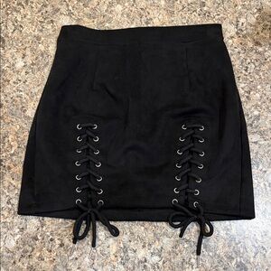 Black faux suede mini skirt with ties down legs size M
